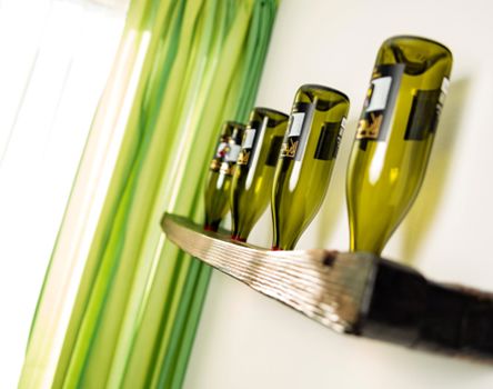 Empty wine bottles are used as decorative elements in the Double Room Vinum